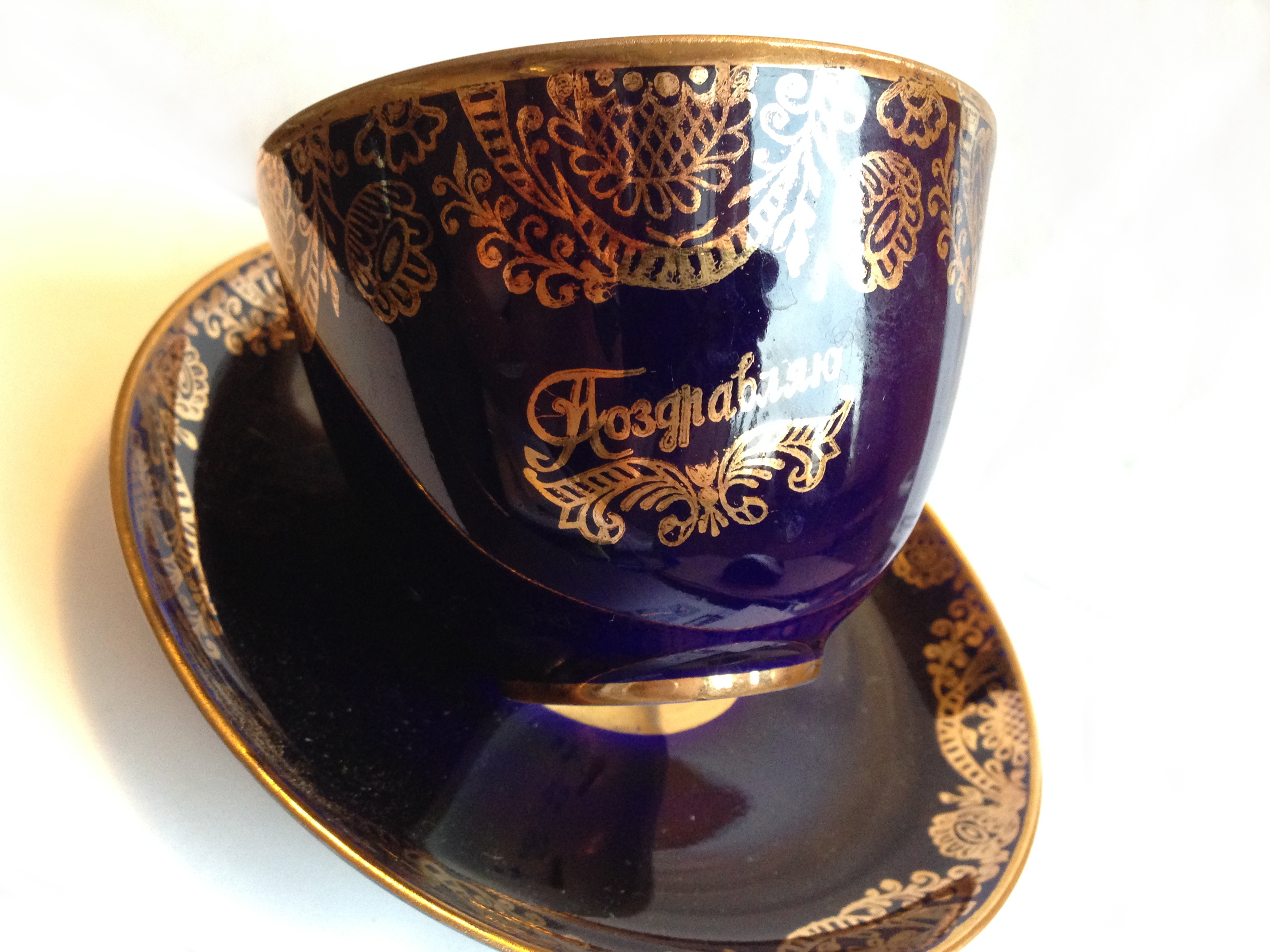 Porcelain tea set with golden pettern